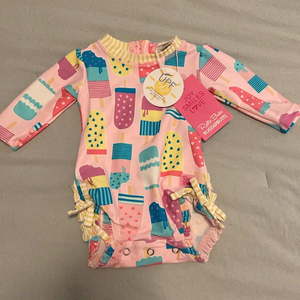 NWT ruffle butts 0-3 month swimsuit